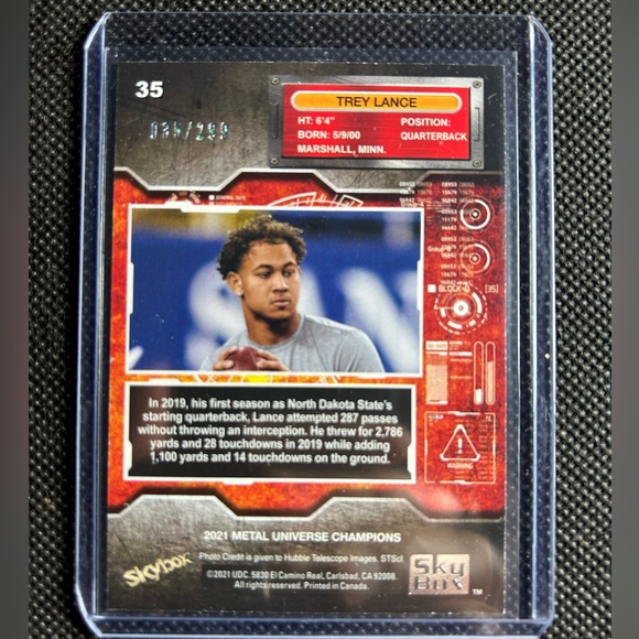 2021 Skybox Metal Universe Champions Trey Lance Silver Dots Rookie /299 SF 49ers - Picture 2 of 2